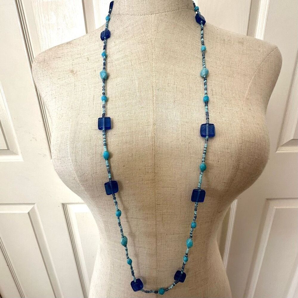 Long blue glass beaded necklace